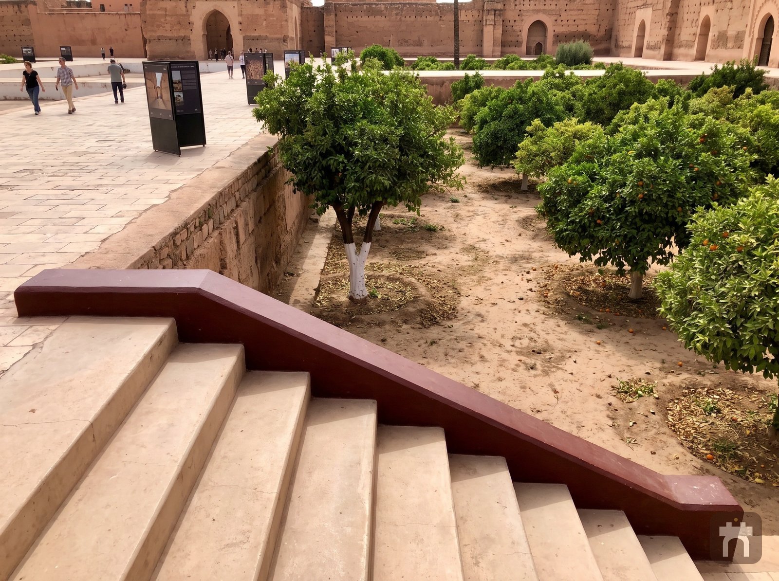 Stairs descending toward the orange gardens, with the palace ruins behind